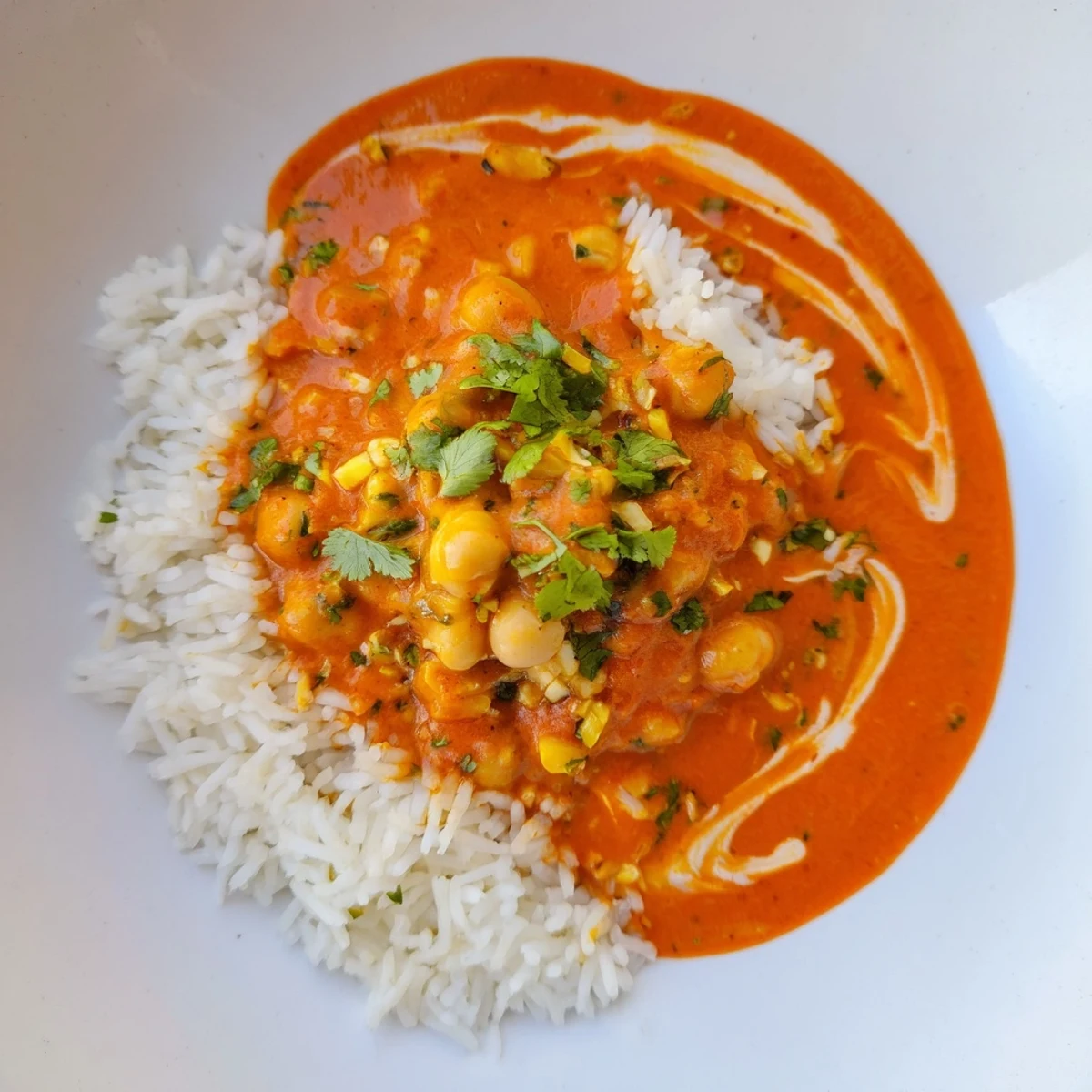 Creamy Vegan Chickpea Tikka Masala, a fragrant Indian delight, served over fluffy white rice.