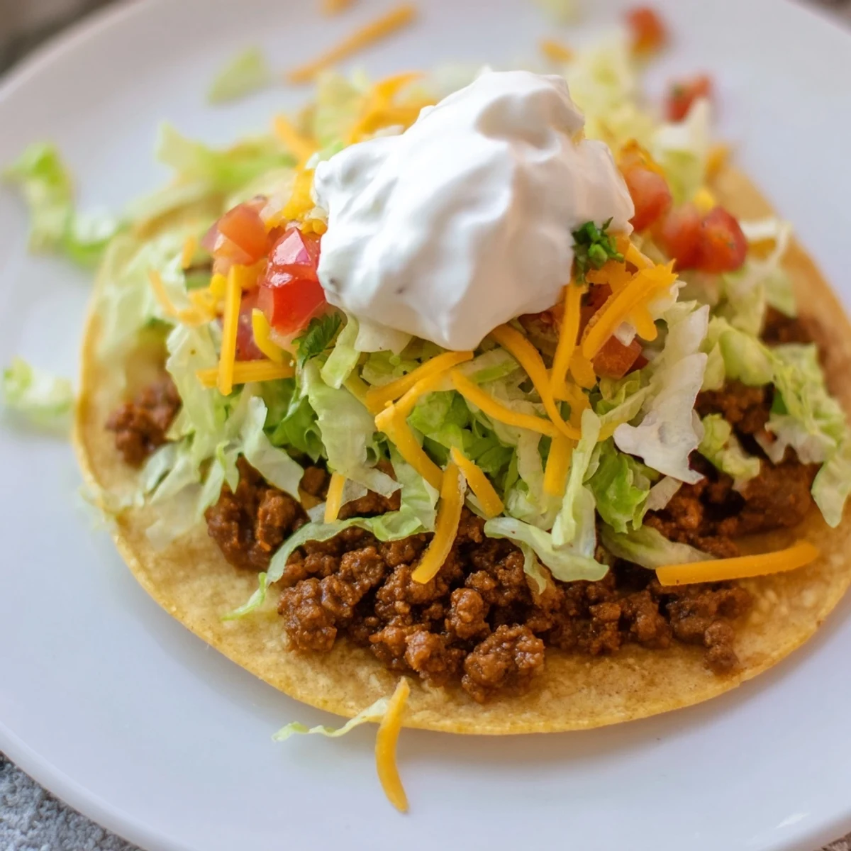 Beef Tacos with Corn Salsa feature juicy seasoned beef and fresh diced tomatoes nestled in warm corn tortillas.