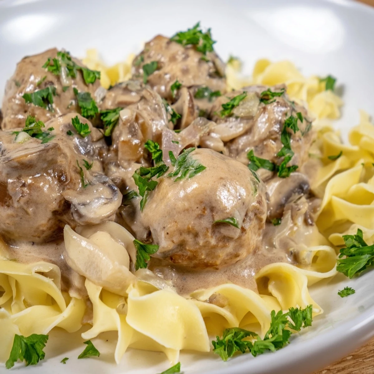 Hearty Turkey Meatball Stroganoff pairs juicy turkey meatballs and velvety sauce with egg noodles for family-style comfort.