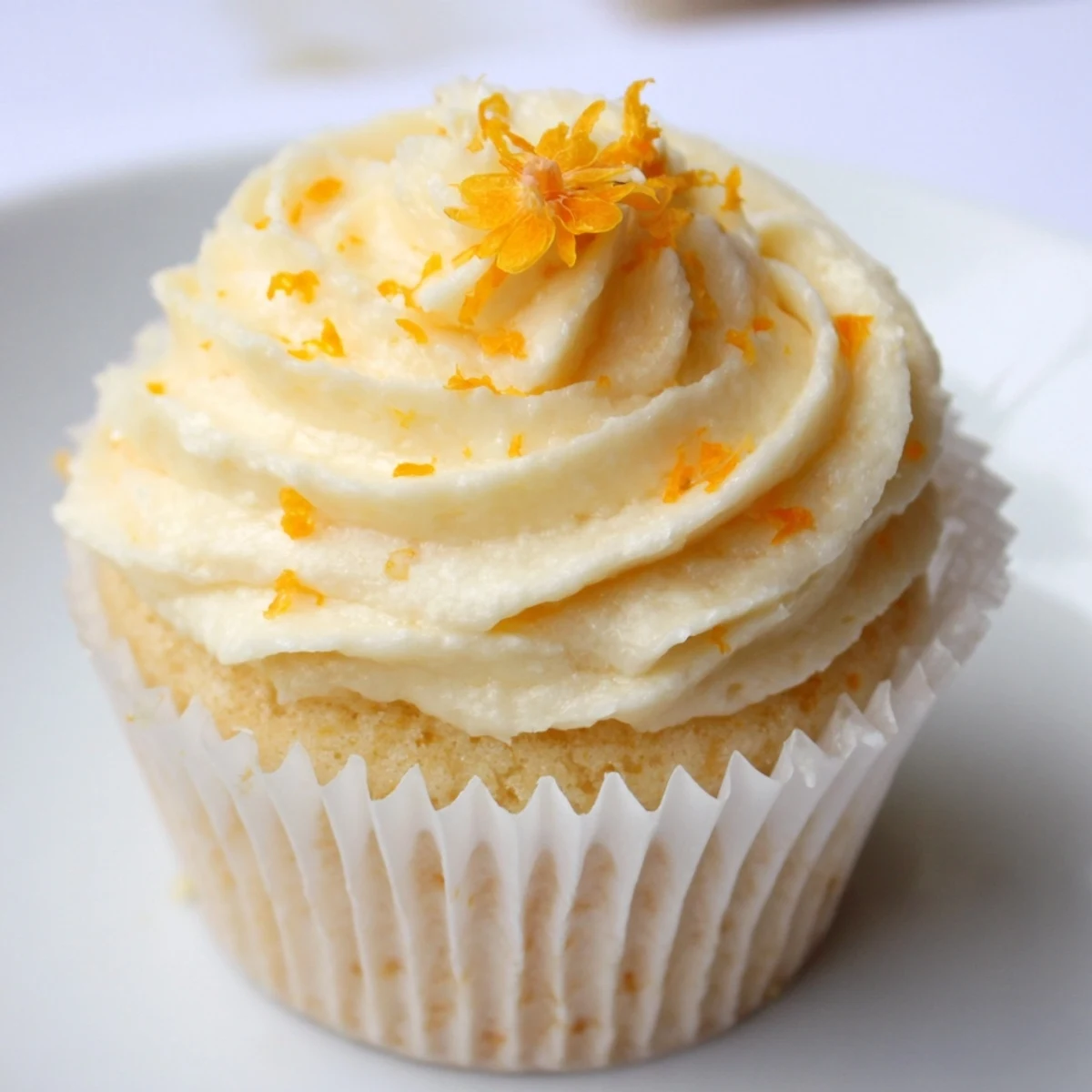 Delicate floral vanilla cupcakes infused with fragrant orange blossom water and creamy buttercream