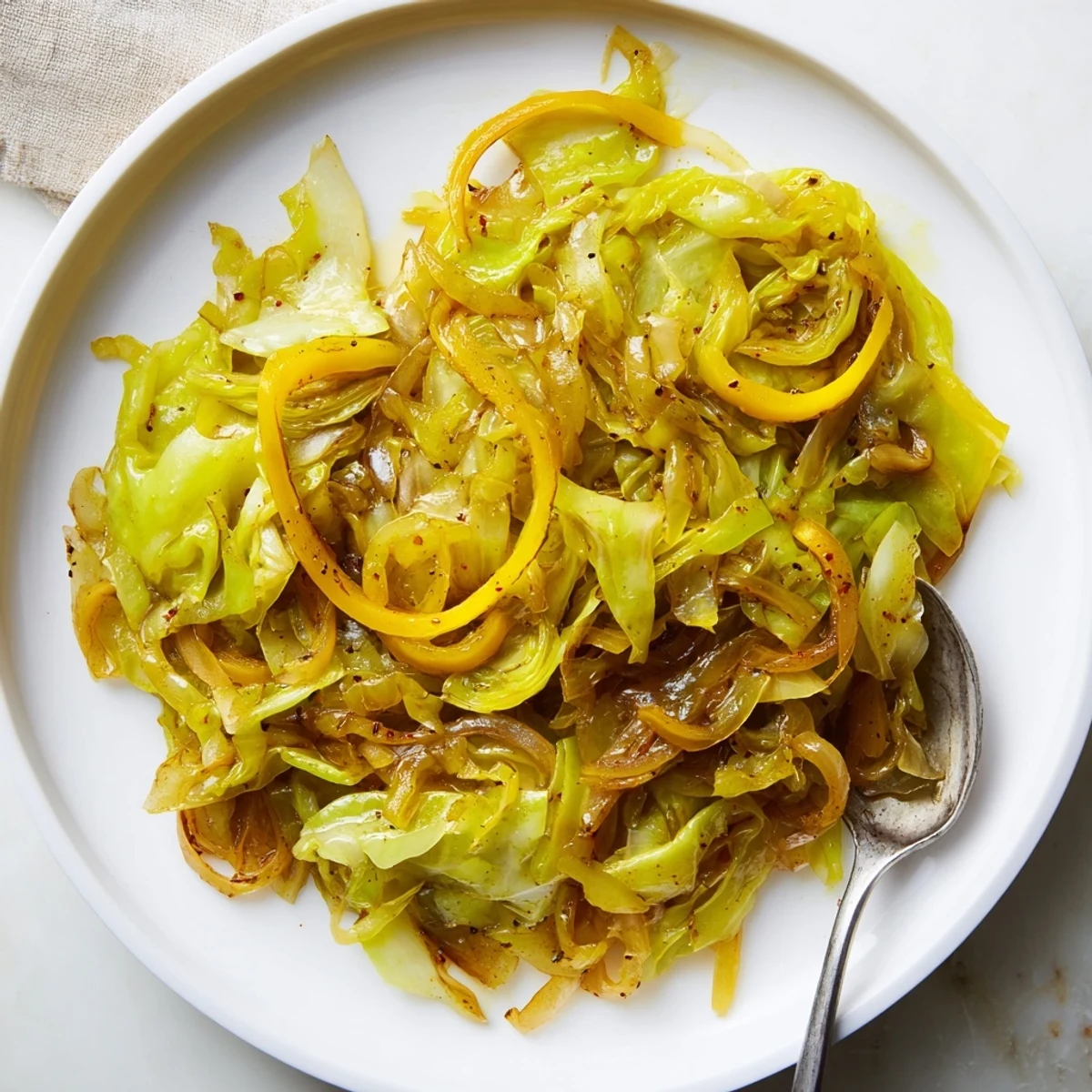 Hearty Savory Braised Cabbage Recipe served hot with crusty bread, tangy vinegar